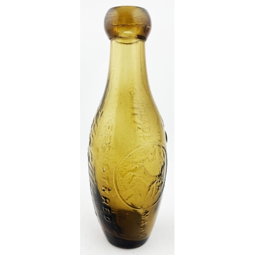 28 - RUTHIN SODA WATER FLAT BOTTOMED HAMILTON. 7ins tall. Light brown glass. Embossed THE RUTHIN/ SODA WA... 