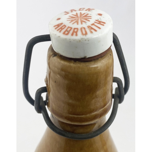 43 - JAMES JACK ARBROATH GINGER BEER BOTTLE. 9ins tall, ch., t.t., original swing stopper (named to top).... 