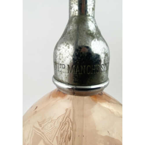 58 - MANCHESTER SODA SYPHON. 12ins tall to the top of the trigger. Bright salmon pink glass, AD shaped bo... 