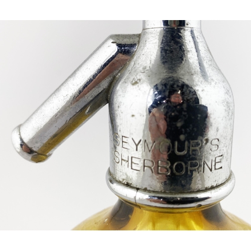 97 - SHERBORNE SODA SYPHON. 12ins tall to the top of the trigger. Nice amber smooth glass with flared foo... 