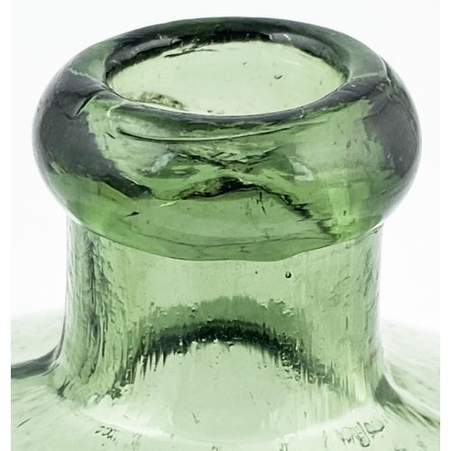 189 - DAFFYS ELIXIR. 5ins tall. Light green glass wonderfully whittled, rounded lip. Classic heavily embos... 