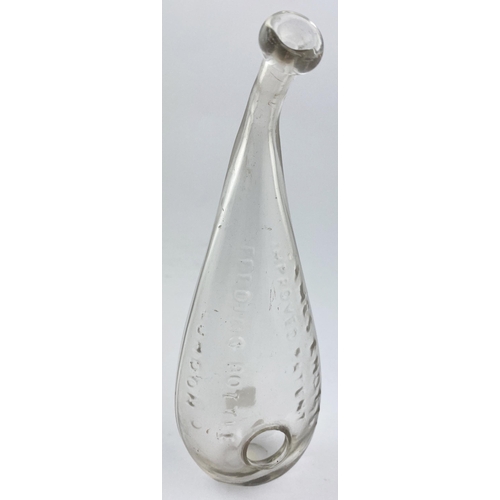 191 - KNOTT PATENT BABY FEEDER. 7.2ins long. Clear glass hand blown form with upturned neck, ground base p... 