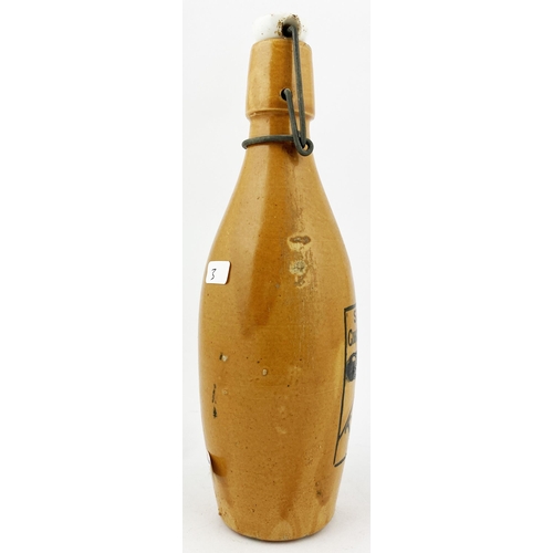 202 - THOMPSONS ABERDEEN SKITTLE SHAPED GINGER BEER BOTTLE. 9.1ins tall, skittle shape, all over orange bo... 