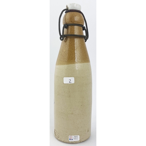 204 - JAMES GORDON MONTROSE GINGER BEER BOTTLE. 9.1ins tall, ch., t.t., blob lip, unusual wired on swing s... 