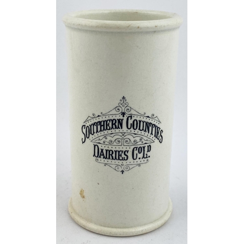 156 - SOUTHERN COUNTIES CREAM POT. 4.8ins tall. White body, decorative black transfer. Light body crazing ... 