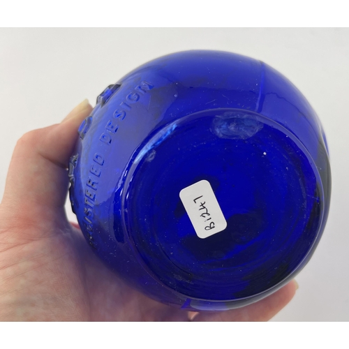 327 - CREMEX SHAMPOOING VASE. 7.5ins tall. Cobalt blue glass, embossed to front, ribbed back. Slight ding ... 