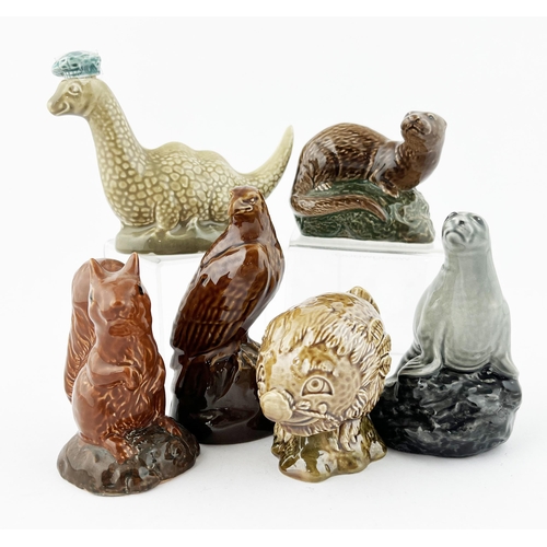 348 - BESWICK WHISKY FIGURAL DECANTERS. Tallest 4.25ins. Inc. Loch Ness monster, squirrel, seal, eagle etc... 