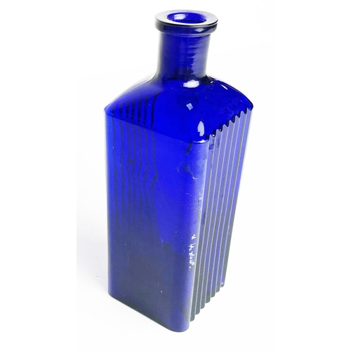 367 - SHEFFIELD CORPORATION POISON BOTTLE. 7ins tall. Square body, embossed to front panel, ribbed to eith... 