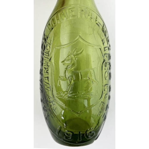 368 - WARWICK MINERAL COMPANY HAMILTON BOTTLE. 7ins tall. Heavily embossed with deer pict to centre plus r... 