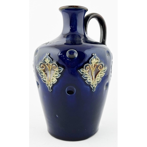 383 - DOULTON LAMBETH ARTWARE SCOTCH JUG. 8.5ins tall. Embossing to shoulder, dints around body with flora... 