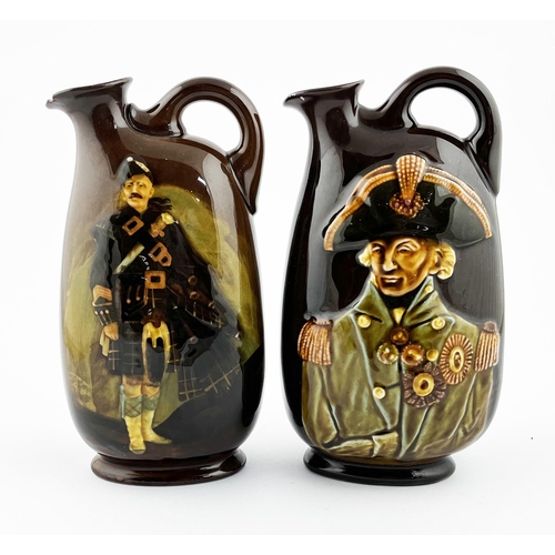 426 - KINGSWARE FLASK DUO. Tallest 8ins. Nelson & Kilted man figure to other. Lip repair & damage. (2)