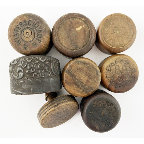 429 - WOODEN STOPPER GROUP. Largest 1.75ins. One pewter outer ? Winterschladen, Rylands plus some plain. (... 