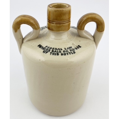 658 - GREYBEARD WHISKY JUG. 6.5ins tall. Double sided, side handles, base p.m. Minor lip nick.