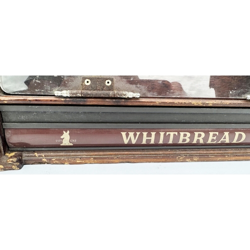 31 - WHITBREAD FRONT LOADING CABINET. 15.5 x 11.5ins. Wood effect, glass fronted, pull down door, adverti... 