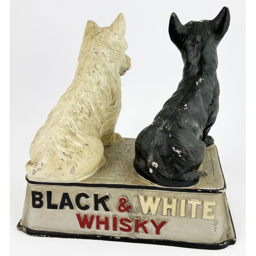 8 - BLACK & WHITE WHISKY BACK BAR FIGURE. 10.5ins diam. Cold cast early advertising statuette of the fam... 