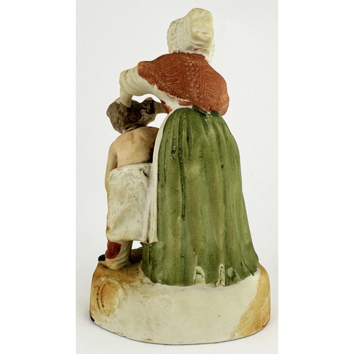 24 - PEARS SOAP FIGURE. 6ins tall. Mastt porcelain type multi coloured figure of lady scrubbing a little ... 