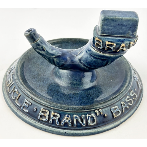 55 - BASS BUGLE BRAND M B FOSTER & SONS MATCHBOX HOLDER & ASHTRAY. 5.9ins diam. All over shiny blue glaze... 