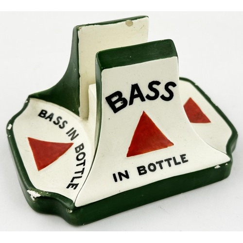 57 - BASS MATCHSTRIKER ASHTRAY & MATCHBOX HOLDER. 5.1 x 3.9ins base diam. Central match box holder, two a... 