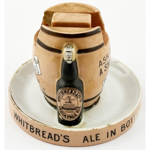 62 - . WHITBREADS STOUT IN BOTTLE ASHTRAY & MATCH HOLDER. 5.2ins diam. Beer barrel centre matchbox holder... 