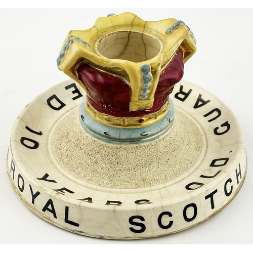 59 - BARNEYS 10 YEARS OLD ROYAL SCOTCH MATCH HOLDER, STRIKER & ASHTRAY. 6.3ins diam. Crown shaped, multi ... 