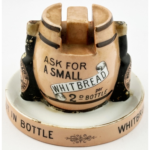 62 - . WHITBREADS STOUT IN BOTTLE ASHTRAY & MATCH HOLDER. 5.2ins diam. Beer barrel centre matchbox holder... 