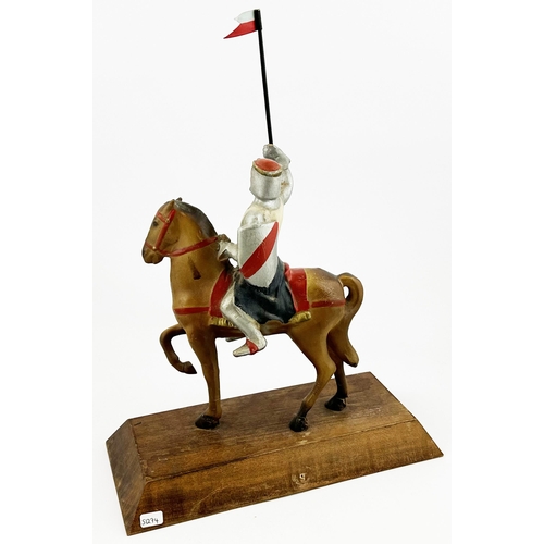 67 - CHIVAS REGAL SCOTLANDS PRINCE OF WHISKIES ADVERTISING STATUETTE. 15.5ins tall, rubberoid, on wooden ... 