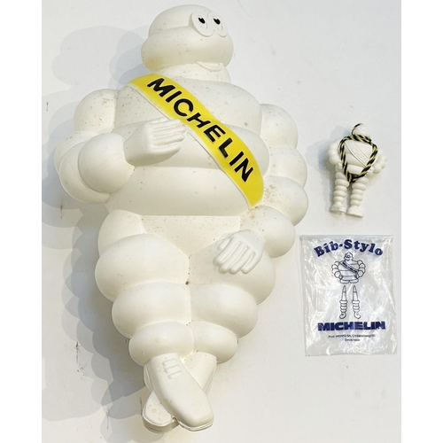 147 - PLASTIC MICHELIN MAN FIGURINE plus small pen holder figure. Tallest 16ins. Hard plastic with metal s... 