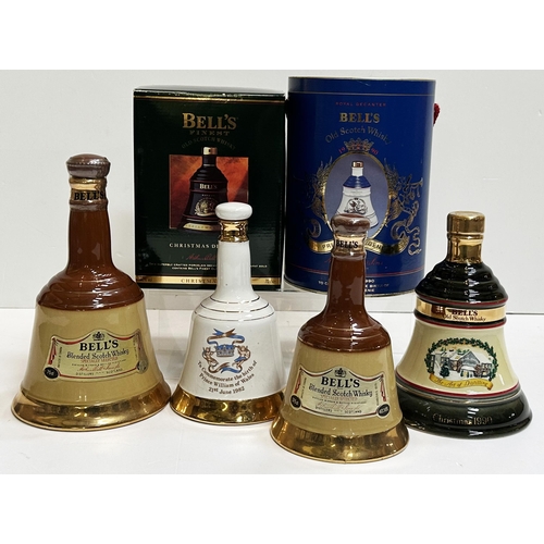 168 - BELLS WHISKY DECANTER GROUP. Tallest 9ins. Various shapes & sizes, some boxed with contents.