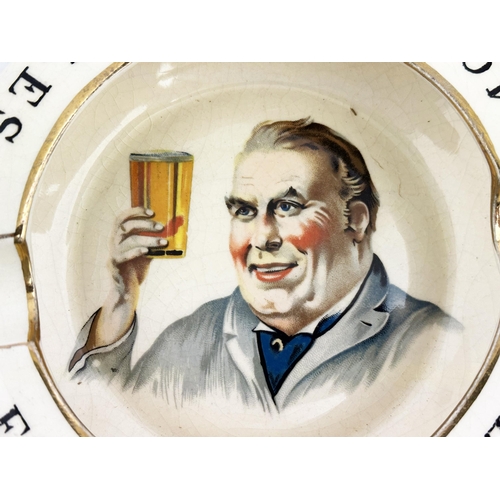 170 - FREDK SMITHS MODEL ALES ASHTRAY. 5.6ins diam. Multi coloured image of cheery gent holding aloft a pi... 