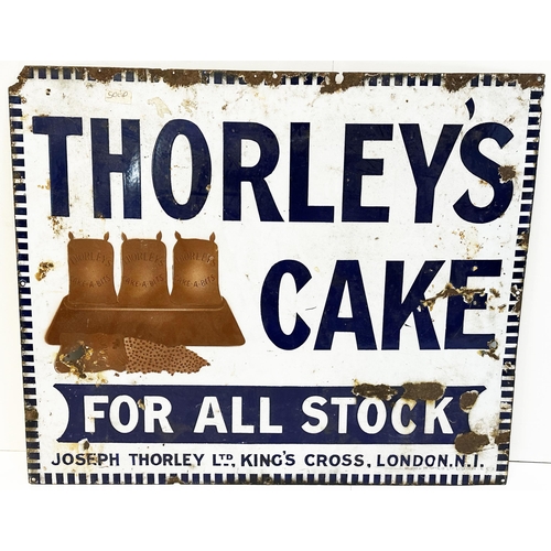 193 - THORLEYS CAKE ENAMEL SIGN. 32 x 27ins. Detailed bags of cake- a- bits to left. Rusting & shot marks.