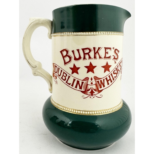 105 - BURKES DUBLIN WHISKY BAR TOP JUG. 6.25ins tall. Straight sided design with bulbous base area, both t... 