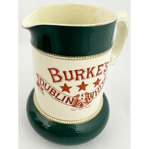 105 - BURKES DUBLIN WHISKY BAR TOP JUG. 6.25ins tall. Straight sided design with bulbous base area, both t... 