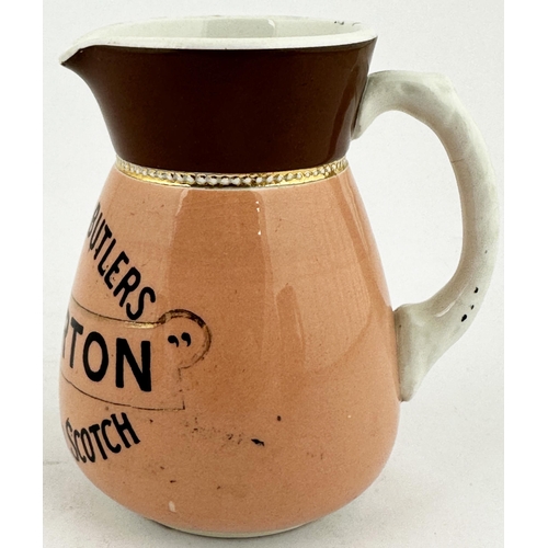 205 - MITCHELL & BUTLERS BALLY BOY OLD IRISH WHISKY WATER JUG. 4.5ins tall. Pouring lip, rear handle. Pink... 