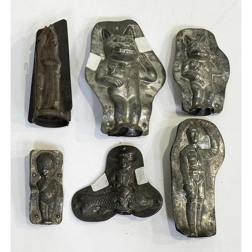 250 - CHOCOLATE MOULDS GROUP. Largest 7ins. Inc. Large & small Felix the Cat, boy on a fish, boy scout, ba... 