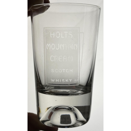 224 - HOLTS MOUNTAIN CREAM WHISKY GLASS. 3.75ins. Clear glass, acid etched to two sides. HOLTS/ MOUNTAIN/ ... 