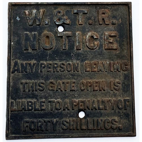 263 - W & TR CAST IRON SIGN. 11 x 10.25ins. Heavy embossed railway sign? Rusting & wear.