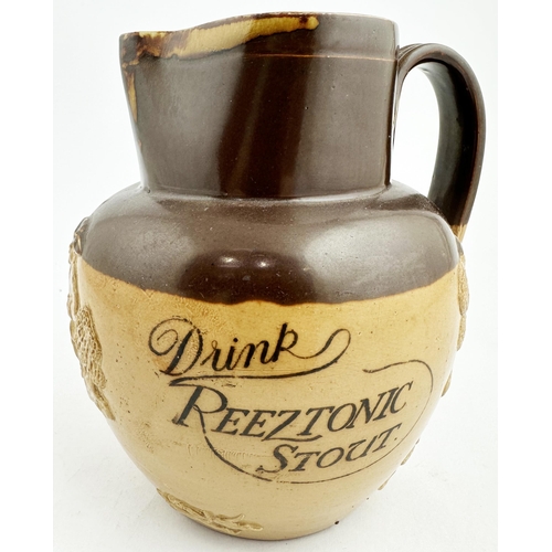 267 - REEZTONIC STOUT 5.7ins tall. Classic t.t. sprigged Doulton Lambeth hunting jug, one side carrying a ... 