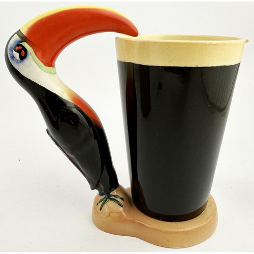 287 - TOUCAN DRINKING GUINNESS STATUETTE. 7.5ins tall. Original multi coloured hand painted toucan drinkin... 