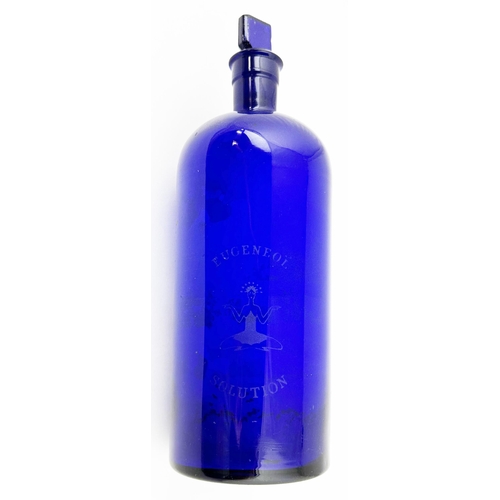 308 - EUGENE ADVERTISING STATUETTE & BOTTLE. Figure 18 ins tall, cobalt bottle 10.8ins to stopper top. Pla... 