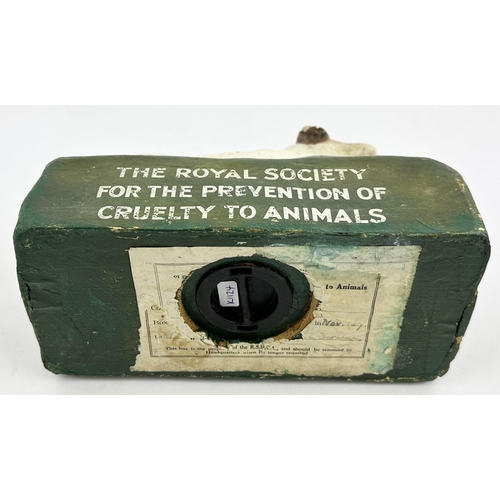 322 - RSPCA DOG FIGURAL DONATIONS BOX. 6.8ins tall, base 4.1 x 8.5ins. Papier mache form, naturalistically... 