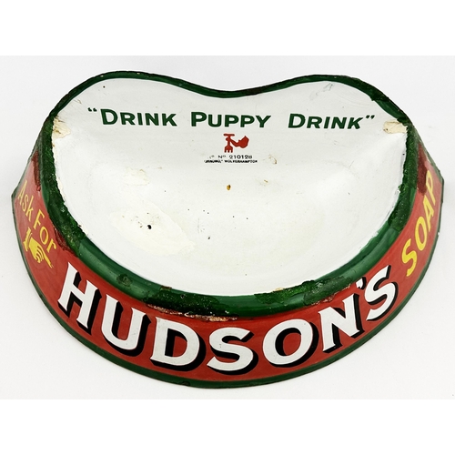 329 - HUDSONS SOAP ENAMEL DOG BOWL. 14.5ins across the back, 7ins deep. Semi circular enamelled bowl brigh... 