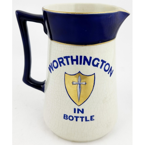 336 - WORTHINGTON IN BOTTLE PUB JUG. 6.5ins tall. Printed both sides. Gold bands & shield intact. Blue top... 