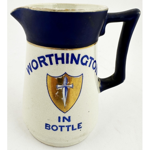 337 - WORTHINGTON IN BOTTLE PUB JUG. 4.75ins tall. Printed both sides. Gold bands & shield slightly worn. ... 