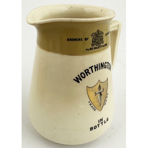 338 - WORTHINGTON IN BOTTLE PUB JUG. 4.5ins tall. Printed both sides, side handle. Mustard coloured band t... 