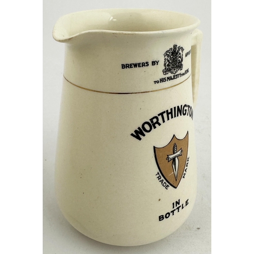 340 - WORTHINGTON IN BOTTLE PUB JUG. 4.5ins tall. Printed both sides, side handle, white band to top, must... 