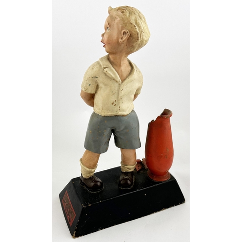 356 - DUROFIX LARGE ADVERTISING FIGURE. 17ins tall. Impressive painted rubberoid figure of small boy holdi... 