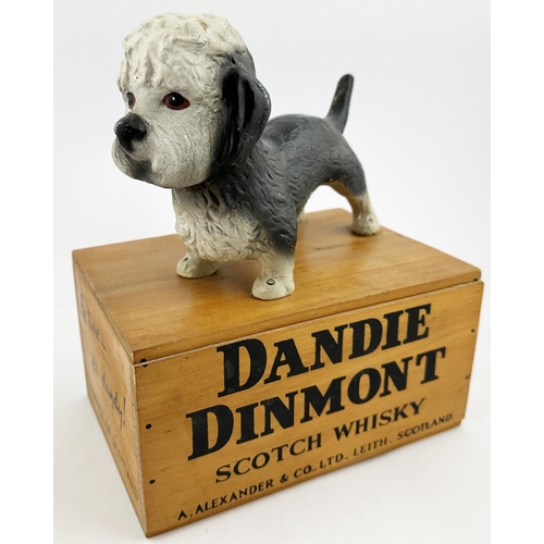 358 - DANDIE DINMONT SCOTCH WHISKY ADVERTISING DOG ON BOX. 10.5ins tall, base 8.5 x 6ins. Painted rubberoi... 