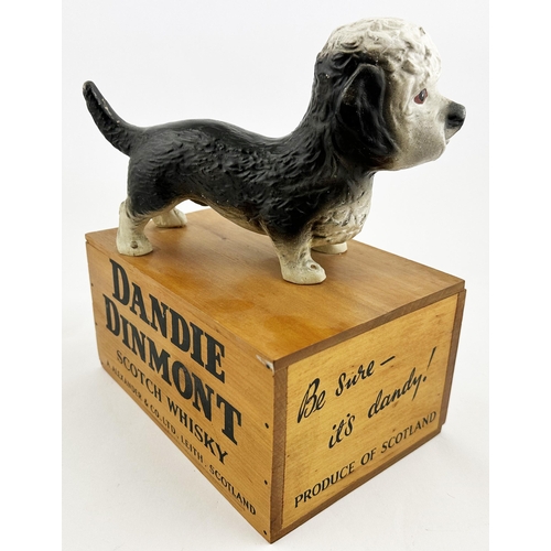 358 - DANDIE DINMONT SCOTCH WHISKY ADVERTISING DOG ON BOX. 10.5ins tall, base 8.5 x 6ins. Painted rubberoi... 