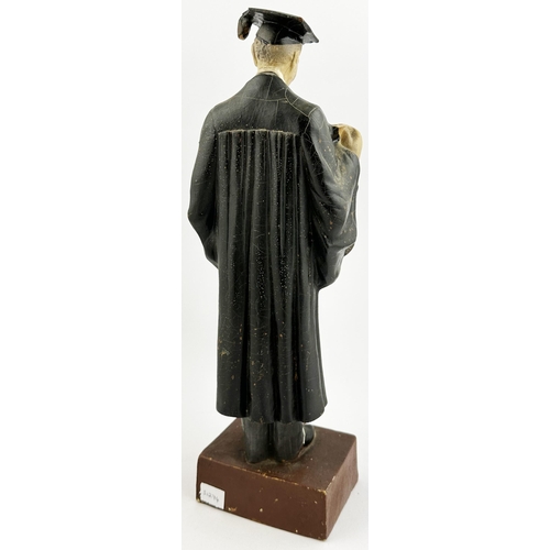 361 - TEACHERS HIGHLAND CREAM SCOTCH WHISKY ADVERTISING STATUETTE. 13ins tall, rubberoid. University gown ... 