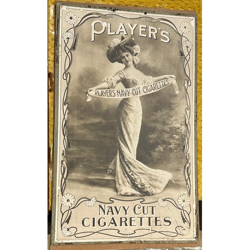 37 - PLAYERS NAVY CUT CIGARETTES FRAMED SHOWCARD. 13.5 x 21ins. Black & white hatted lady to centre holdi... 